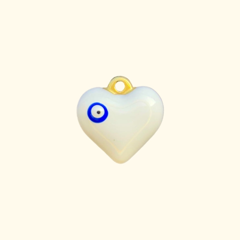 COEUR AVEC OEIL DE PROTECTION ( 2 couleurs )